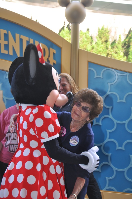 Minnie Mouse hugging Grahms